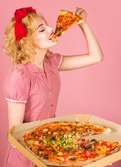 Happy woman eat pizza. Diet, health, fast food, snacks, lunch. Pin-up girl eating pizza.