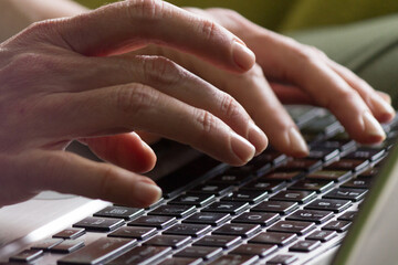 Woman hands work on computer