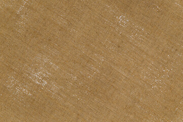 creative background: reverse side of primed linen, translucent spots of white primer paint