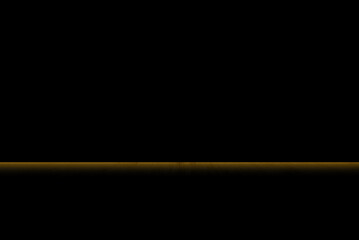 Horizontal golden light on dark textured background with copy space for product or text showcase. Emotional low light texture image background. 