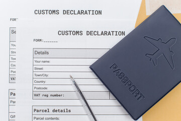a Passport over Customs Declaration form. customs Agent concept. Planning a deal or shipping item parsel on post. - obrazy, fototapety, plakaty