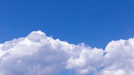 Blue sky background with clouds