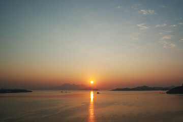 Obraz premium Sunrise over calm harbour