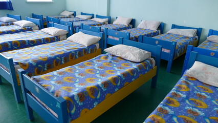 small beds in kindergarten for children 