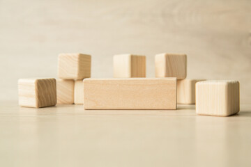 Stack wooden blocks on a wooden background