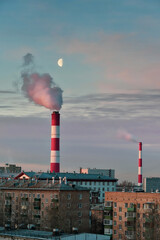 Cooling towers against the background of a cloudy sky	