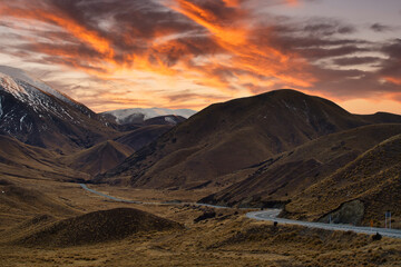 Spectacular views, beautiful valley at dawn and twilight sky at Lindis Pass Summit scenic lookout is a popular attraction in the South Island of New Zealand.