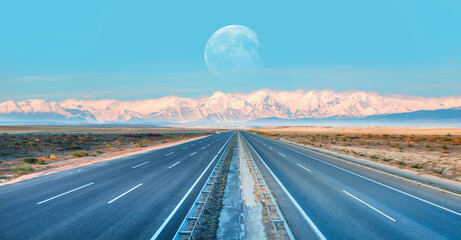 A long straight road leading towards a Taurus (Toros) mountain with full moon 