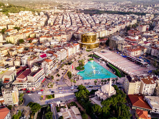 Aerial photograph of the capital of Aydin province - Aydin city  from high point of drone fly in sunny day in Turkey. Amazing aerial cityscape view on beautiful city centre and parks.