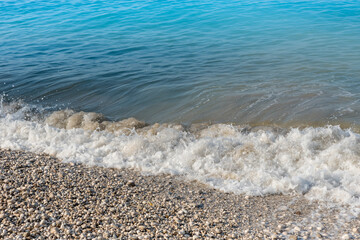 Sea waves on the pebble beach