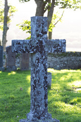 old celtic cross on a cemetery