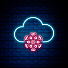 Glowing neon line Cloud with snow icon isolated on brick wall background. Cloud with snowflakes. Single weather icon. Snowing sign. Colorful outline concept. Vector