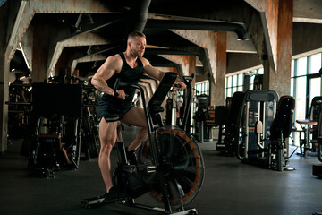 man with weight training in gym equipment sport club