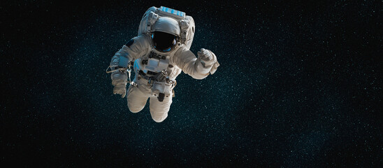 Astronaut spaceman do spacewalk while working for space station in outer space . Astronaut wear full spacesuit for space operation . Elements of this image furnished by NASA space astronaut photos. © InfiniteFlow