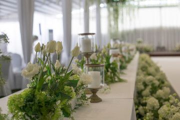 Beautifully decorated in white colours wedding hall.