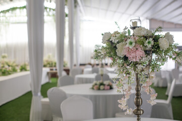Beautifully decorated in white colours wedding hall.