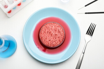 Minced cultured meat served on white lab table, flat lay