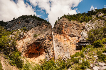 Rinka waterfall located in Logarska dolina national park in Slovenia, Second highest waterfall in Slovenia. Popular hiking destination in the Alps © Zedspider