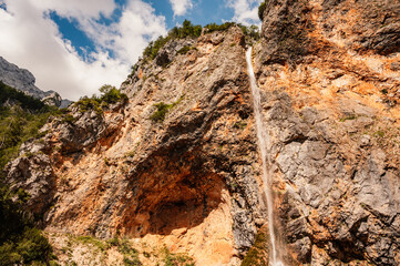 Rinka waterfall located in Logarska dolina national park in Slovenia, Second highest waterfall in Slovenia. Popular hiking destination in the Alps © Zedspider