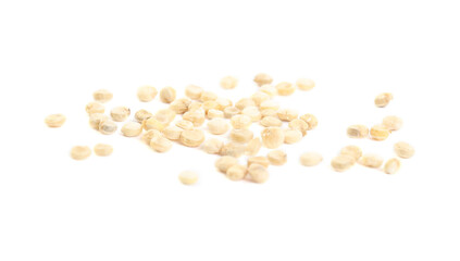 Many raw quinoa seeds on white background