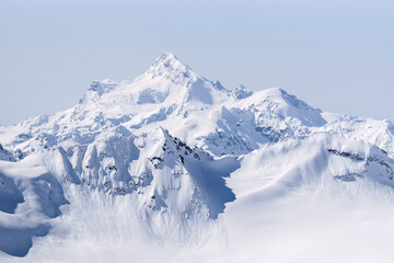 Obraz premium Snow covered Greater Caucasus mountains at winter sunny day. View from Elbrus slope, Kabardino-Balkaria, Russia
