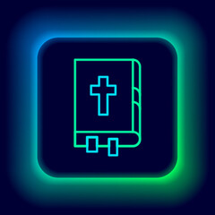 Glowing neon line Holy bible book icon isolated on black background. Colorful outline concept. Vector