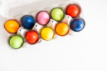 Colorful Easter Egg bottom border over a background. Copy space