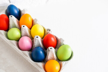Obraz premium Colorful Easter Egg bottom border over a background. Copy space