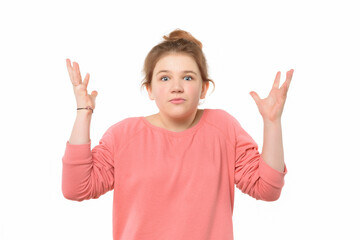 close up teen girl showing doubt expression, confuse and wonder concept, shrugging shoulders