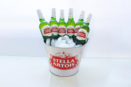 Calgary, Alberta, Canada. March 3, 2021. A beer bucket of Stella Artois beers bottle with ice on a white background.