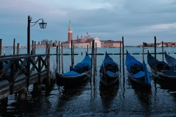 Foto auf Acrylglas Antireflex A variety of gondola just in front of Saint Mark's square and a cathedral church in the background in Venice Italy © DIMITRIOS