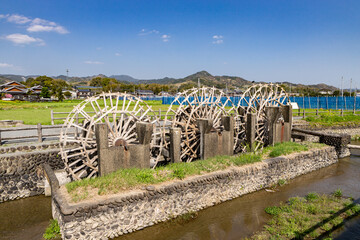 稲作シーズンを待つ現役の三連水車 福岡県朝倉市