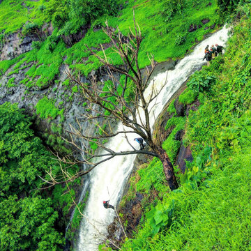 Waterfall rappelling adventure in nature sports