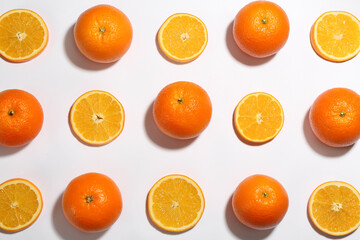 Flat lay composition with fresh ripe oranges on white background