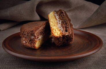 Tiramisu, the cake is cut into two halves.