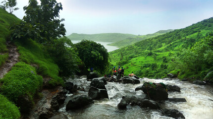 Naklejka premium Hiking in wet weather top view of water body rainy days