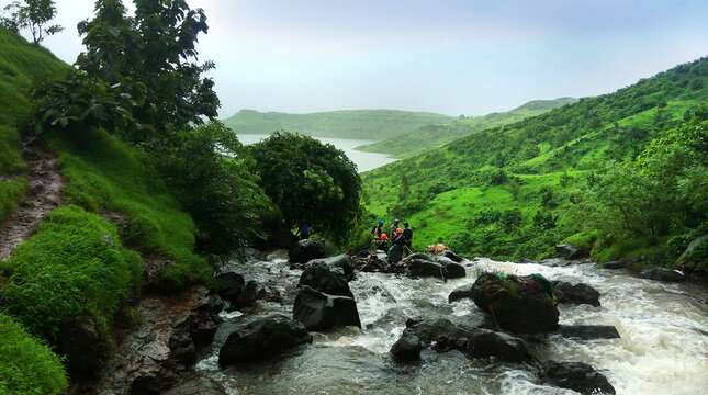 Hiking in wet weather top view of water body rainy days