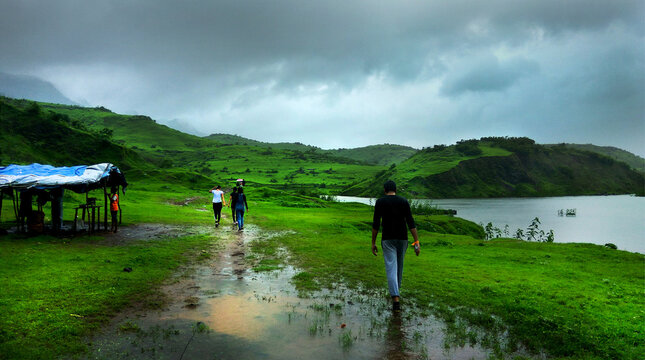 Hiking in wet weather top view of water body rainy days
