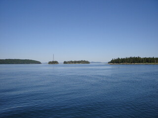 Fototapeta premium Power lines across small islands