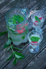 a healthy natural drink based on birch kvass with the addition of berries and mint leaves....