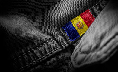 Tag on dark clothing in the form of the flag of the Andorra