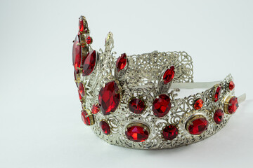 .Crown on a white background, handmade, custom, individually, jewelry for princesses and girls, left side view © Aleksandr