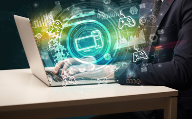 Business hand typing on a modern laptop