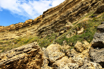 Crystal clear and wild waters in Praia da Foz, Sesimbra, Portugal