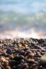 Obraz premium Summer beach on sea pebbles.