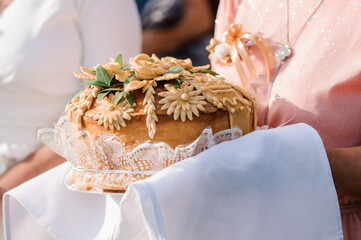Wedding bread decorated with flowers and leaves with dough