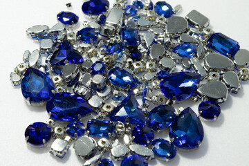 Blue gemstones top view for jewelry close-up.