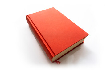 Hard cover red book on a white background