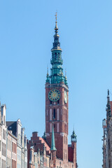 Fototapeta na wymiar Clock tower of Gdansk Town Hall. historic Ratusz located in the Gdansk Main City borough of Srodmiescie.