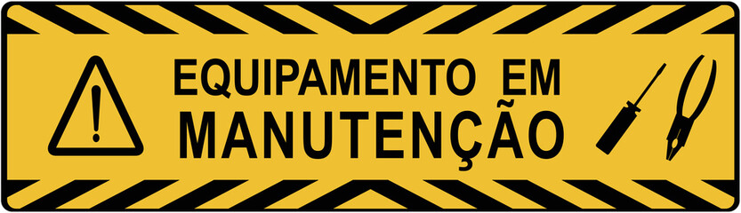 A sign in Portuguese language that says : equipment under maintenance.